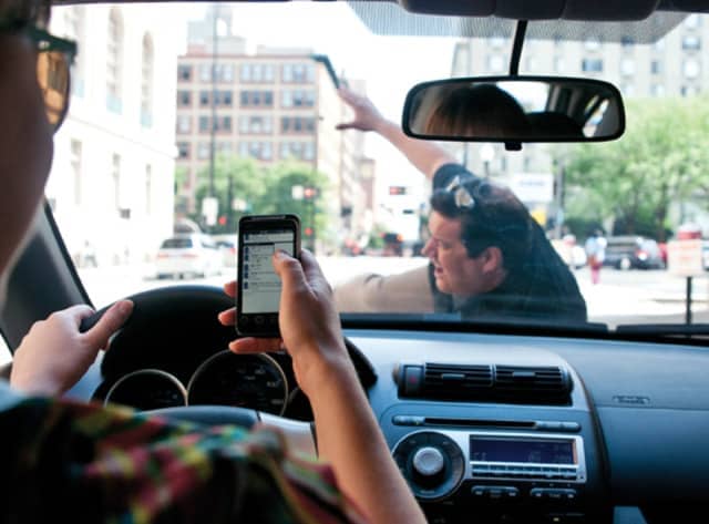 New California Distracted Driving Law Will Penalize Drivers Texting or Holding a Phone